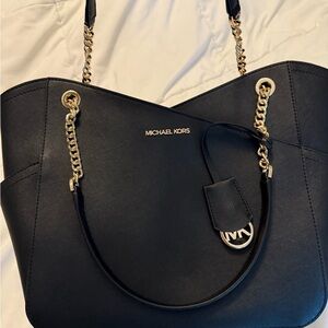 Michael Kors Black and Gold Tote with Classic Silhouette